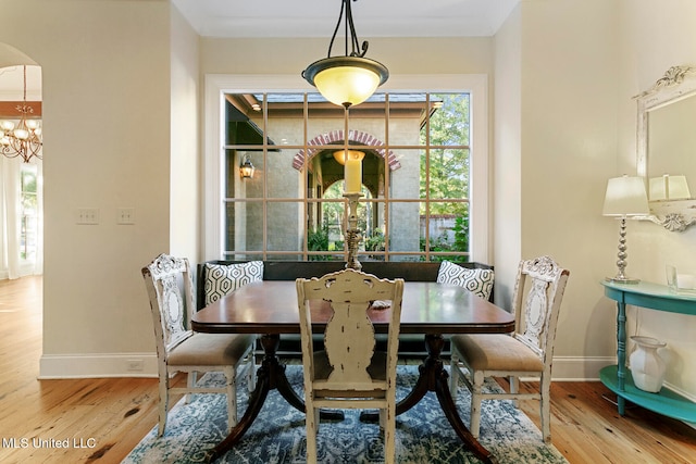 dining area with wood-type flooring