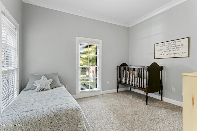 carpeted bedroom with crown molding