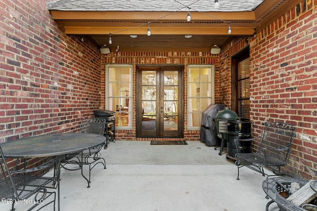 entrance to property featuring french doors