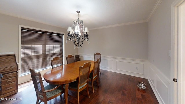 136 Westlake Dr, Brandon, MS 39047 - dining area with a chandelier, crown molding, wood finished floors, and wainscoting