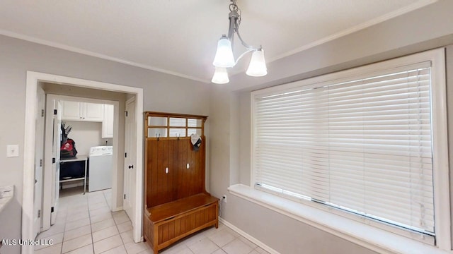 136 Westlake Dr, Brandon, MS 39047 - mudroom featuring washer / dryer, light tile patterned floors, crown molding, baseboards, and a chandelier