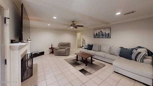 136 Westlake Dr, Brandon, MS 39047 - living room featuring recessed lighting, a ceiling fan, light tile patterned floors, beam ceiling, and a fireplace with raised hearth