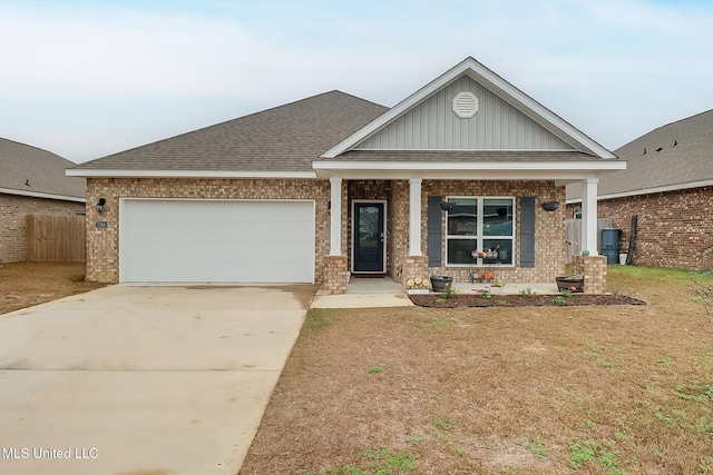 craftsman inspired home with a porch and a garage