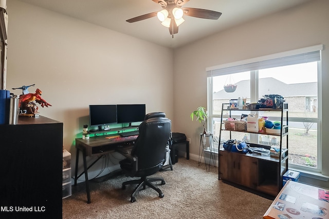 carpeted office with ceiling fan