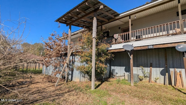 view of home's exterior with central AC unit