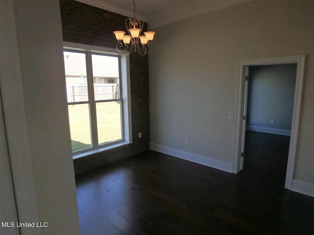 empty room featuring baseboards, plenty of natural light, a chandelier, and dark wood-style flooring