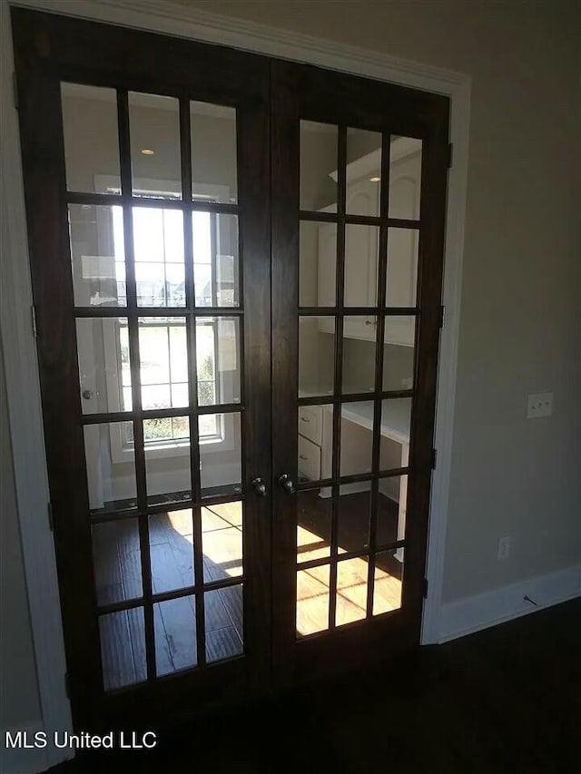 doorway to outside featuring french doors