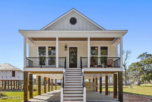 beach home with covered porch and a carport