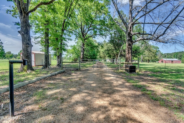 view of property's community with fence