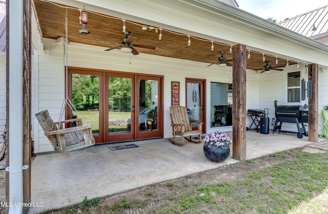 view of patio with ceiling fan, french doors, and a grill