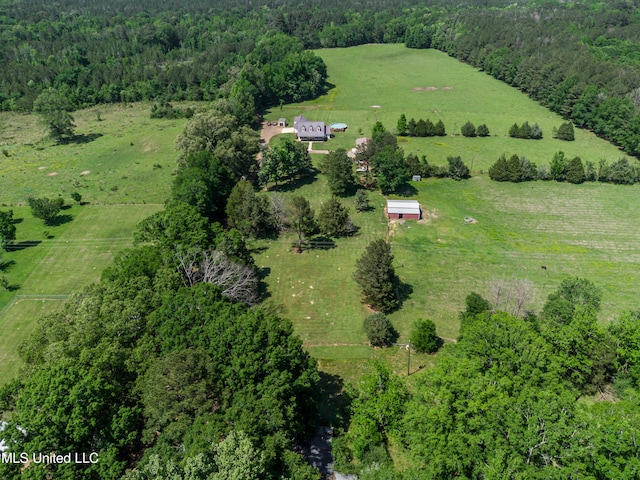 aerial view with a view of trees and a rural view