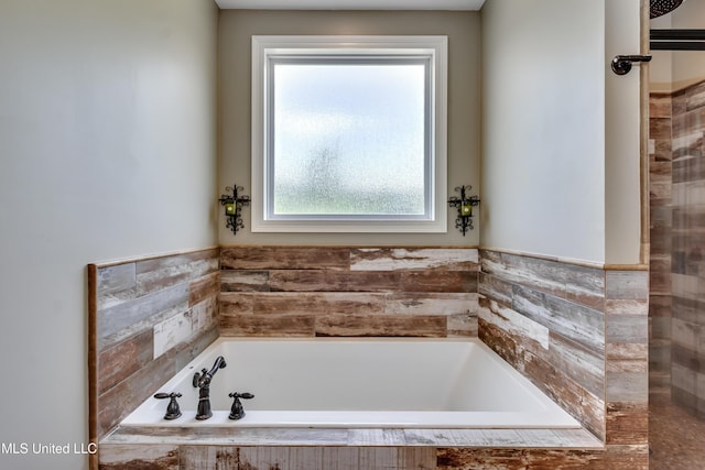 full bathroom featuring a bath
