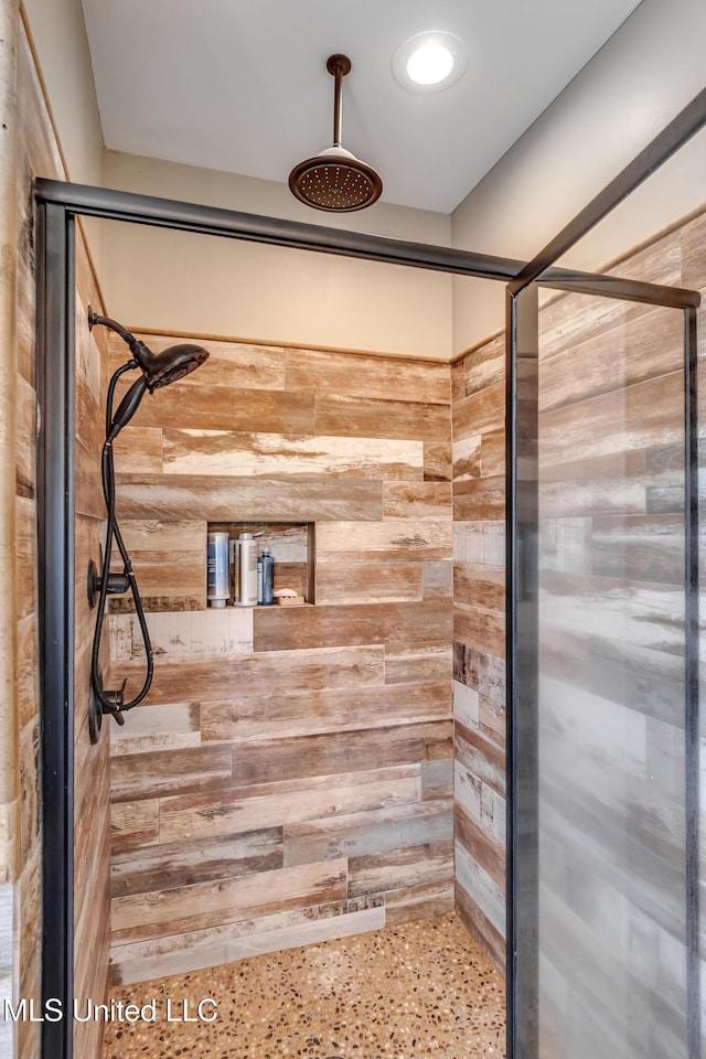 full bathroom with a shower stall