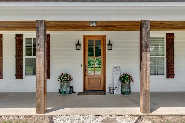 entrance to property with a porch