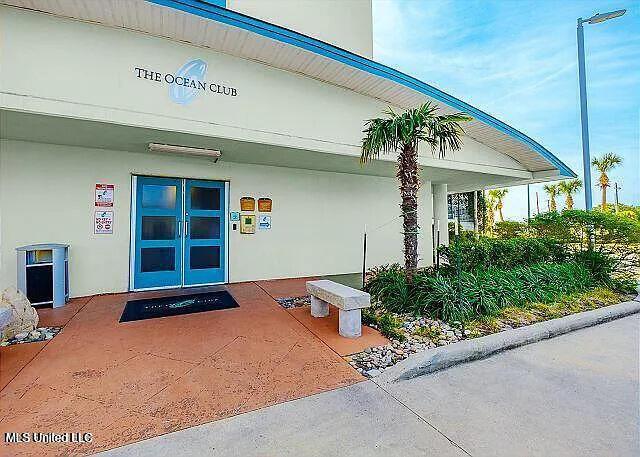2060 Beach Blvd Unit 1206, Biloxi, MS 39531 - property entrance with stucco siding and french doors