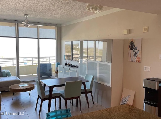 2060 Beach Blvd Unit 1206, Biloxi, MS 39531 - dining space with tile patterned flooring, a textured ceiling, and expansive windows
