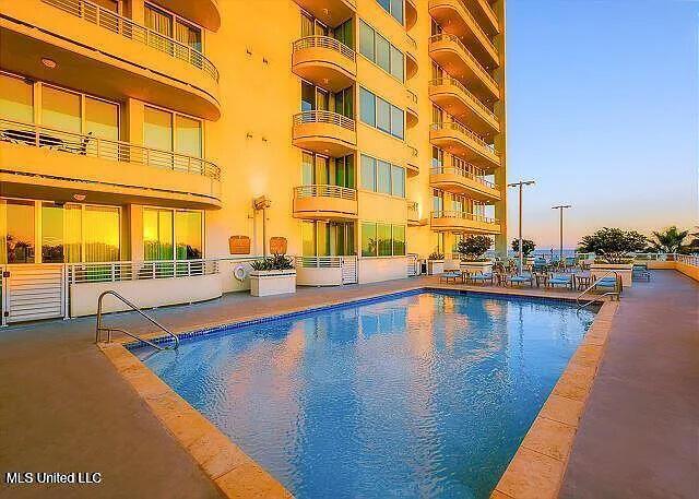 2060 Beach Blvd Unit 1206, Biloxi, MS 39531 - pool at dusk with a community pool