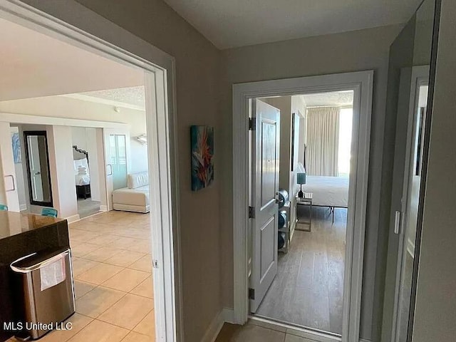2060 Beach Blvd Unit 1206, Biloxi, MS 39531 - hall featuring plenty of natural light and light tile patterned flooring