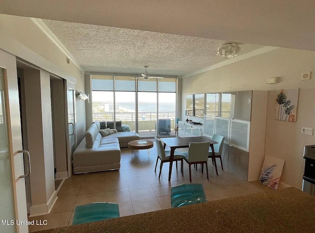 2060 Beach Blvd Unit 1206, Biloxi, MS 39531 - dining area featuring expansive windows, light tile patterned flooring, a textured ceiling, crown molding, and a chandelier