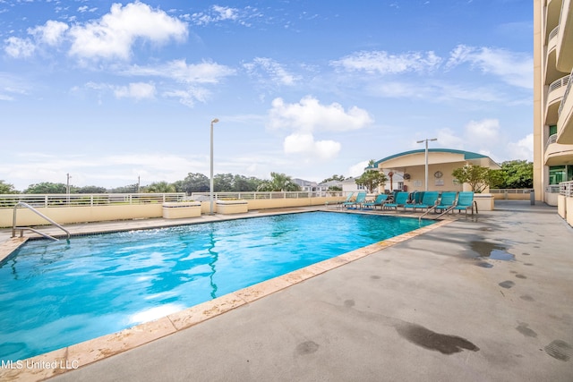2060 Beach Blvd Unit 1206, Biloxi, MS 39531 - community pool with a patio