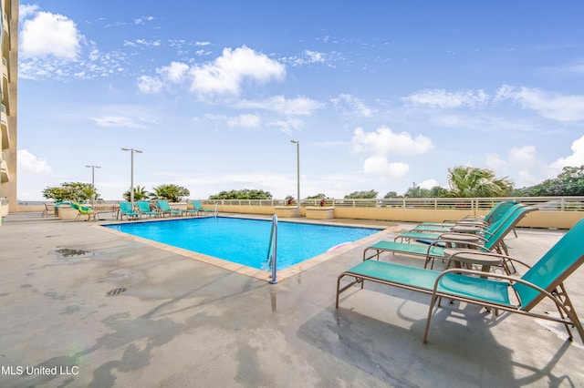2060 Beach Blvd Unit 1206, Biloxi, MS 39531 - community pool with a patio area