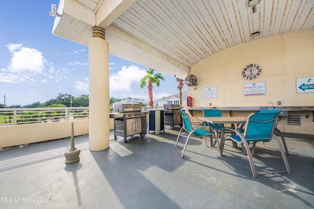 2060 Beach Blvd Unit 1206, Biloxi, MS 39531 - view of patio / terrace featuring outdoor dining area and grilling area
