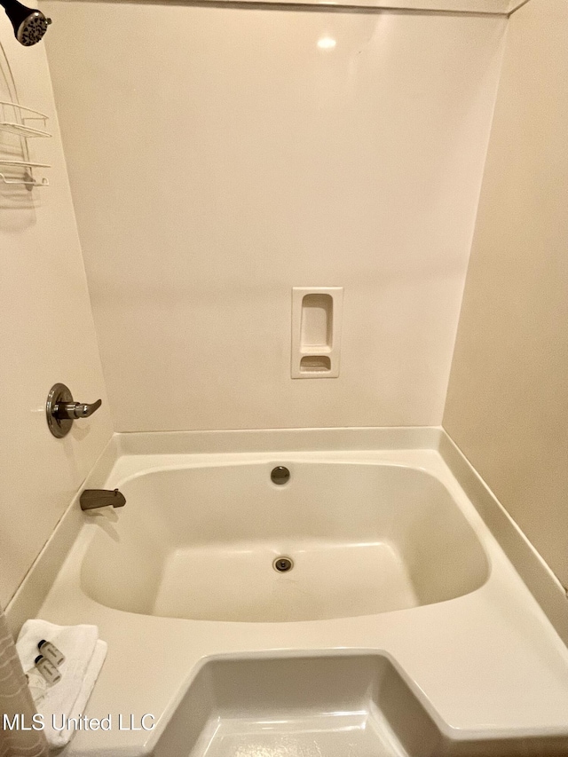 full bathroom with a washtub