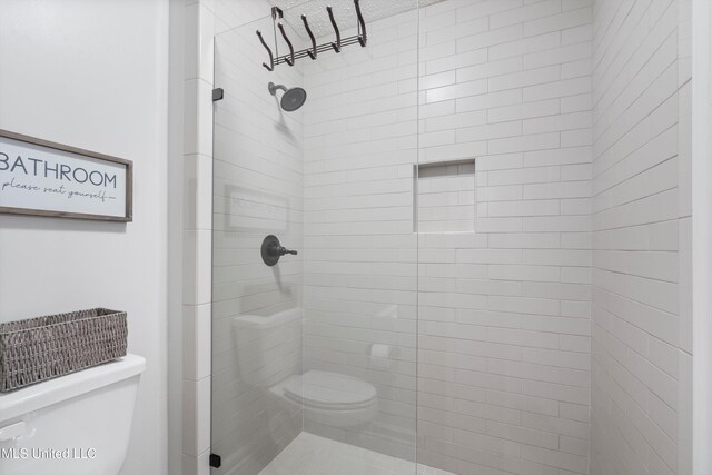 9476 Plantation Rd, Olive Branch, MS 38654 - bathroom featuring a shower stall and toilet