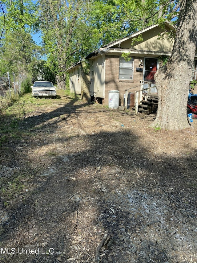 3704 Hollywood Ave, Jackson, MS 39213 - view of home's exterior featuring brick siding