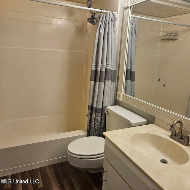 266 Lanai Unit U, Diamondhead, MS 39525 - full bath with toilet, shower / bath combination with curtain, wood finished floors, and vanity