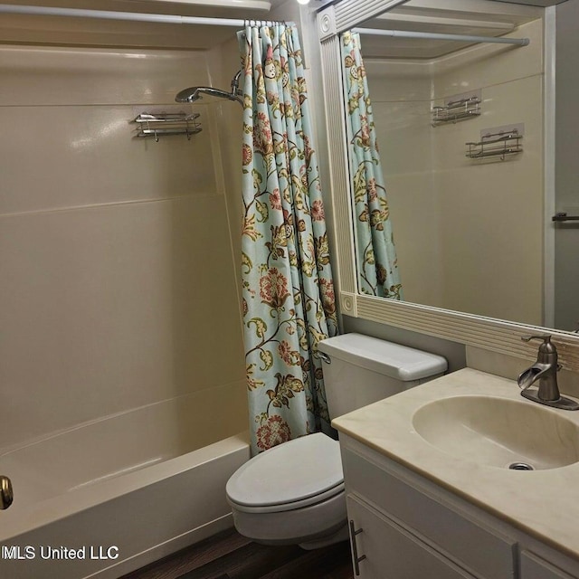 266 Lanai Unit U, Diamondhead, MS 39525 - full bath with vanity, shower / bathtub combination with curtain, toilet, and wood finished floors