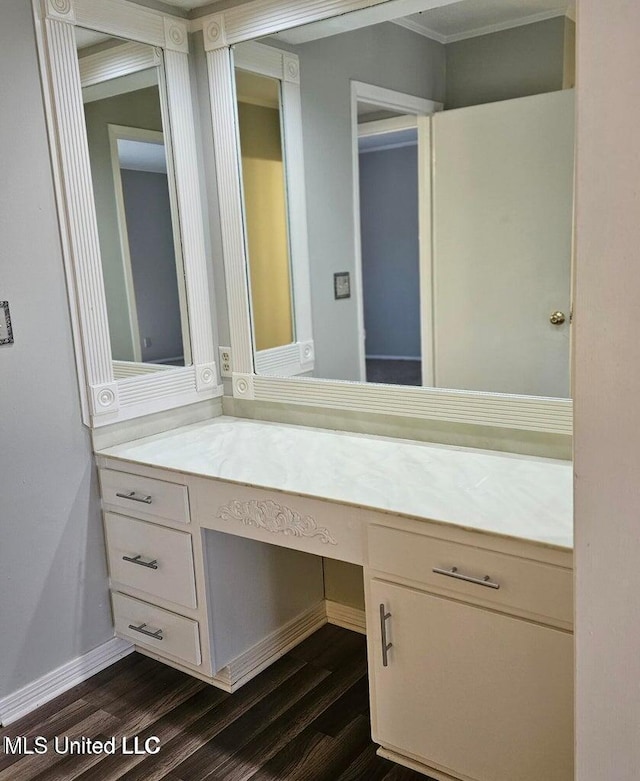 266 Lanai Unit U, Diamondhead, MS 39525 - bathroom featuring vanity, ornamental molding, baseboards, and wood finished floors