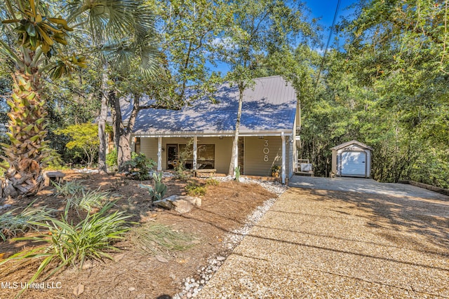 view of front of house with a storage unit