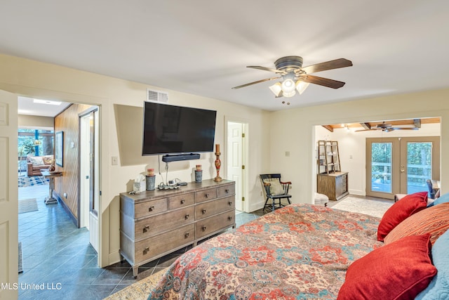 tiled bedroom featuring french doors, access to outside, and ceiling fan