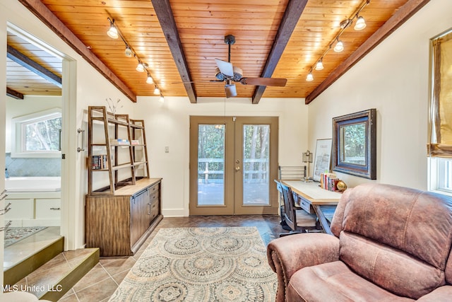 sitting room featuring wood ceiling, track lighting, light tile patterned floors, ceiling fan, and french doors