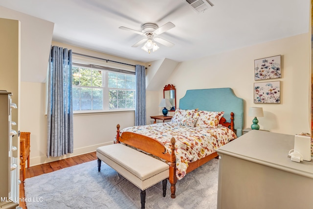 bedroom featuring wood-type flooring and ceiling fan