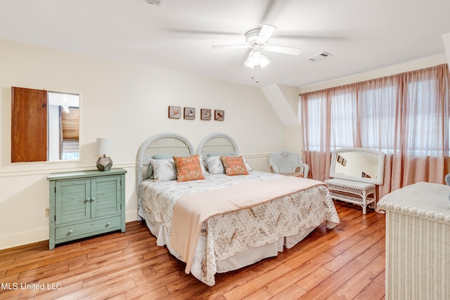 bedroom featuring light hardwood / wood-style floors and ceiling fan