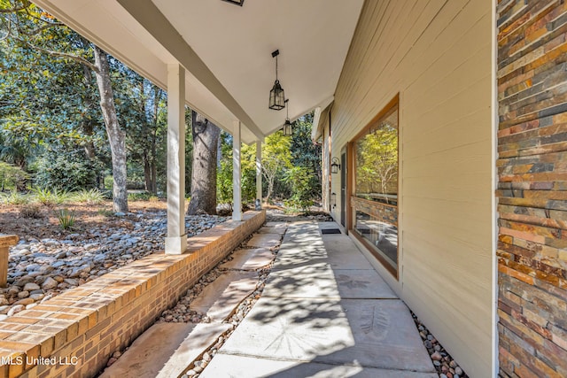 view of patio featuring a porch