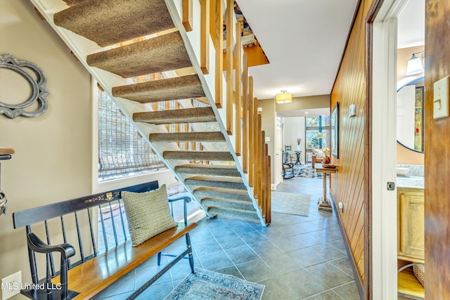 stairs with tile patterned flooring