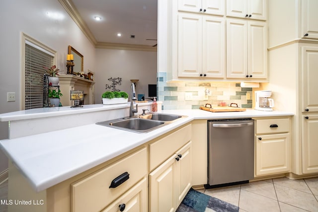704 Tortoise Rdg, Brandon, MS 39047 - kitchen with dishwasher, a sink, a peninsula, decorative backsplash, and light tile patterned floors
