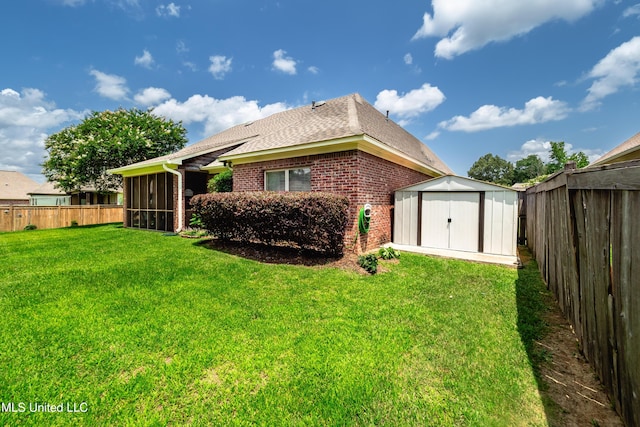 704 Tortoise Rdg, Brandon, MS 39047 - back of property featuring brick siding, a sunroom, and roof with shingles
