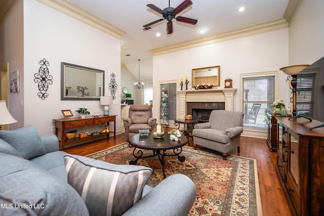 704 Tortoise Rdg, Brandon, MS 39047 - living room featuring ornamental molding, a ceiling fan, wood finished floors, a fireplace, and recessed lighting
