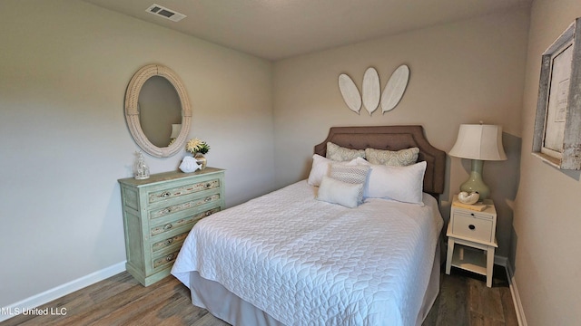 bedroom featuring hardwood / wood-style flooring