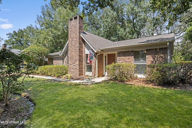 view of front of house with a front yard