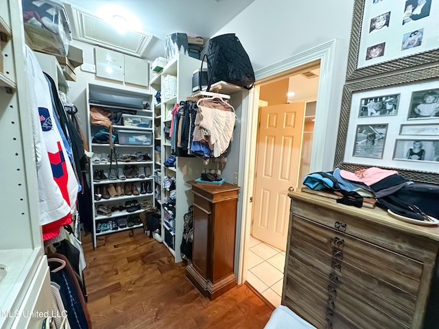 1120 Ford Rd, Terry, MS 39170 - spacious closet featuring attic access and wood finished floors