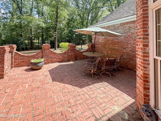 1120 Ford Rd, Terry, MS 39170 - view of patio with view of wooded area
