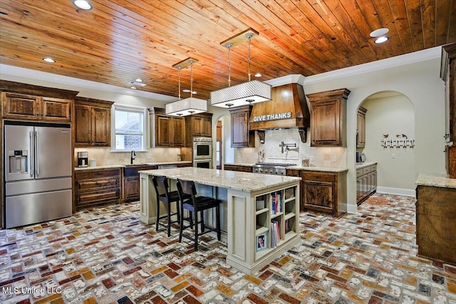kitchen featuring baseboards, arched walkways, wood ceiling, stainless steel appliances, and custom range hood