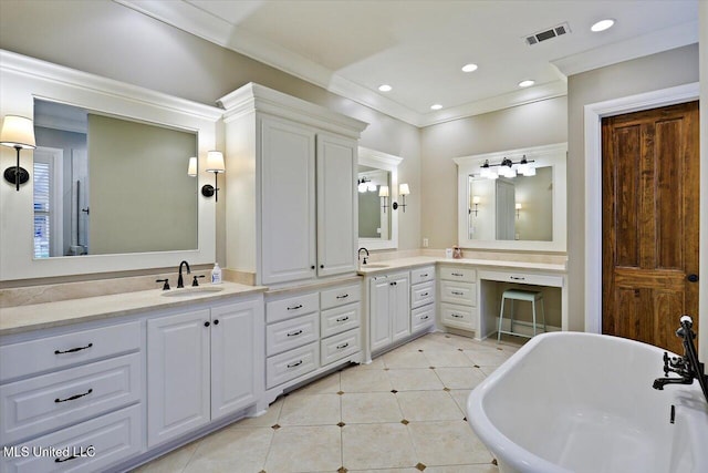 bathroom with visible vents, ornamental molding, a soaking tub, recessed lighting, and vanity