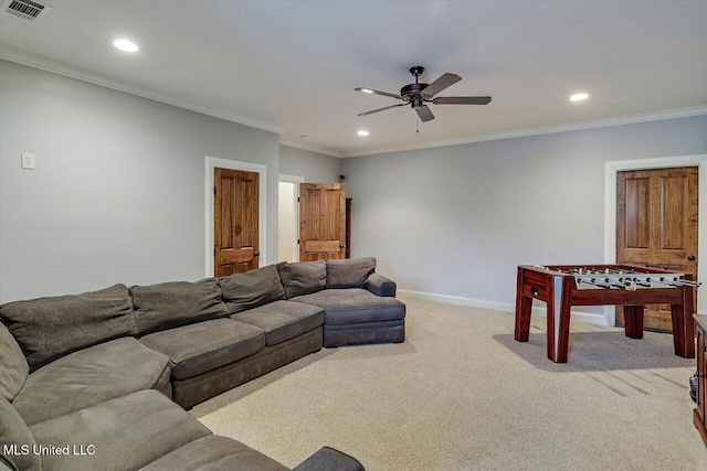 living area featuring light colored carpet, a ceiling fan, visible vents, recessed lighting, and baseboards