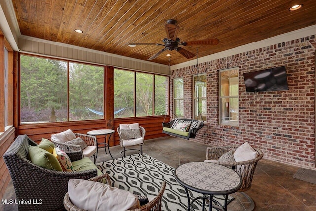 sunroom with outdoor lounge area and ceiling fan